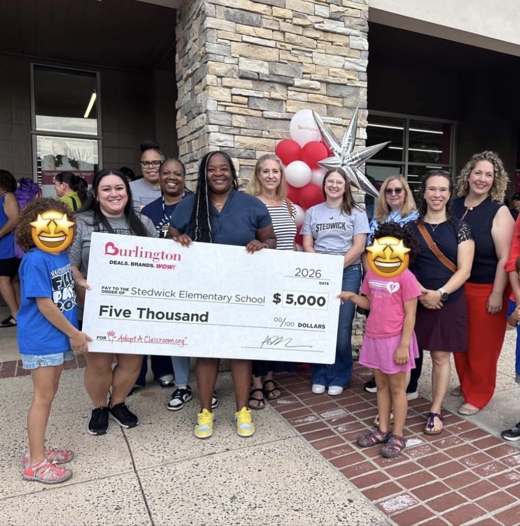 New Burlington Celebrates Grand Opening With $5,000 Donation to Local School