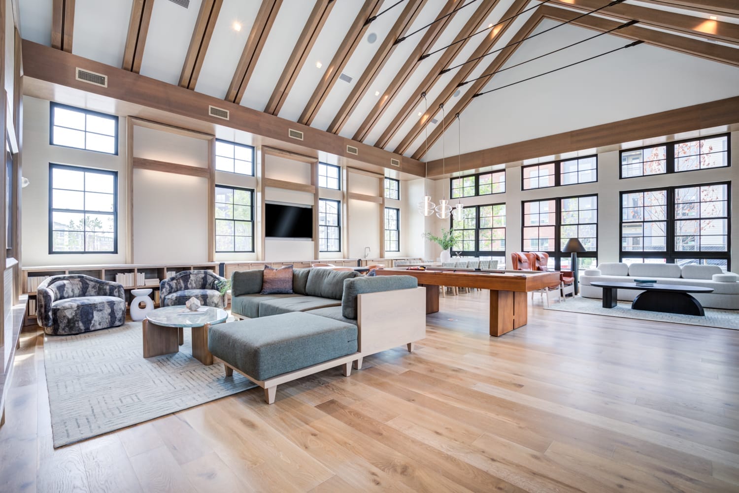 High-design clubhouse with a warm, minimalist aesthetic at EDE Downtown Frederick apartments